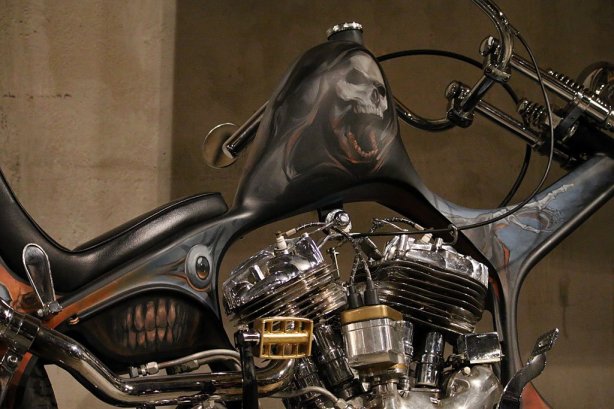 Motorcycle with artistic, hand-painted bodywork and sculptural elements, featured among the strangest motorcycles of 202