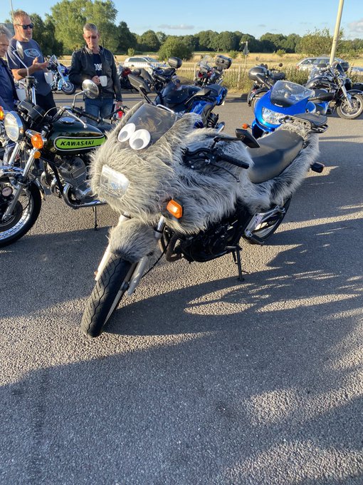 Motorcycle with artistic, hand-painted bodywork and sculptural elements, featured among the strangest motorcycles of 202